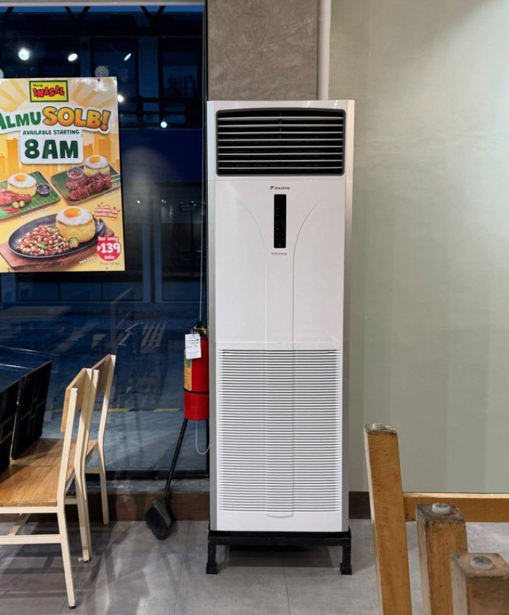 Daikin floor-standing unit on the dining floor of a Mang Inasal branch
